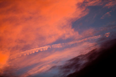 Low angle view of dramatic sky during sunset