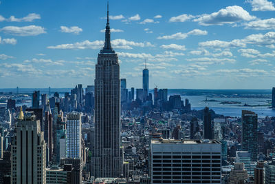 Modern buildings in city against sky