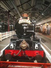 Train in illuminated museum