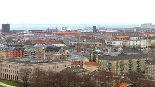 Aerial view of cityscape against clear sky