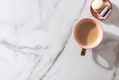 High angle view of coffee cup on table