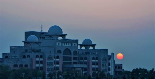 Building against sky during sunset