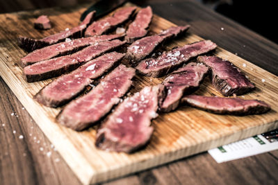 Close-up of meat on cutting board