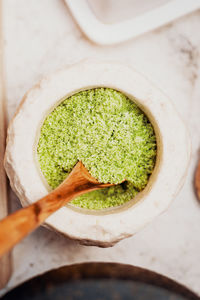 Production of parsley herb salt in a mortar