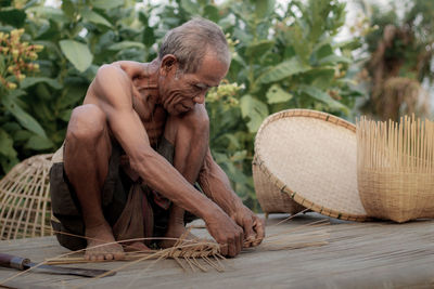 Man working in basket