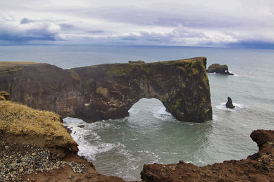 Beautiful landscape with rocky cape and ocean. southern coast of iceland.view of peninsula dyrholaey