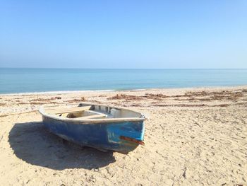 Scenic view of beach against clear sky