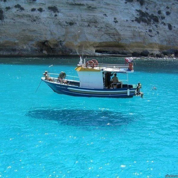 nautical vessel, water, transportation, boat, mode of transport, sea, waterfront, blue, moored, travel, tranquility, tranquil scene, nature, beauty in nature, scenics, sailing, vacations, day, outdoors