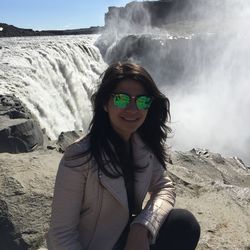 Portrait of young woman wearing sunglasses