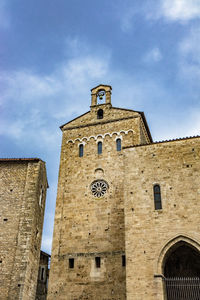 Low angle view of historic building against sky