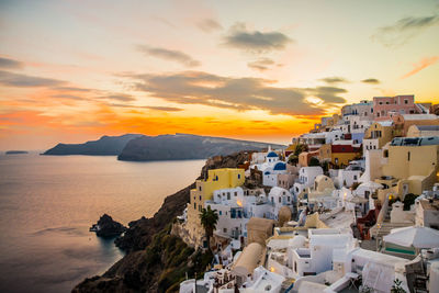 High angle view of town at sunset