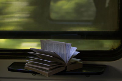 Close-up of open book on table