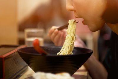 Close-up of person preparing food