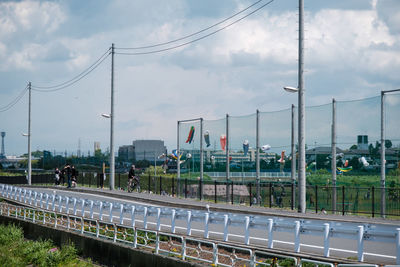 Train on railroad tracks against sky