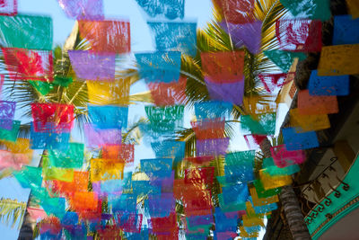 Full frame shot of multi colored flags hanging for sale