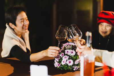 Portrait of woman holding wineglass