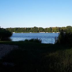 Scenic view of lake against clear sky