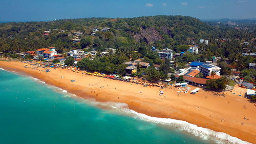 High angle view of beach by buildings in city