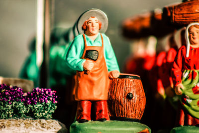 Close-up of figurine for sale at market
