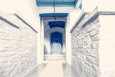Arch bridge in front of building