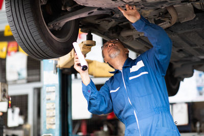 Man working at auto repair shop