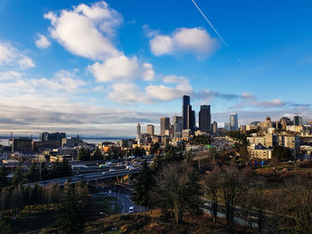 Modern buildings against sky in city