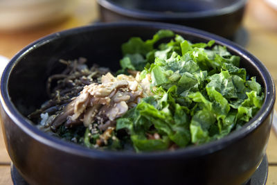 Close-up of bi bim bap served in bowl