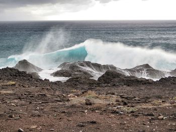 View of waves breaking at shore