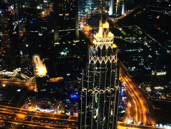 Aerial view of illuminated buildings at night