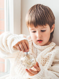 Portrait of boy looking at camera