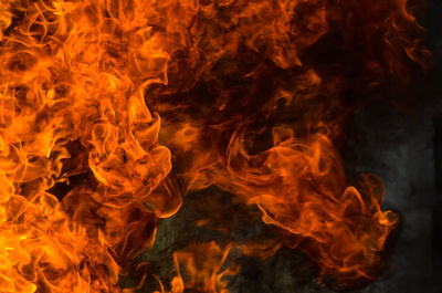 Close-up of fire against black background