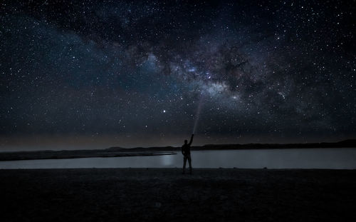 Scenic view of star field against sky at night