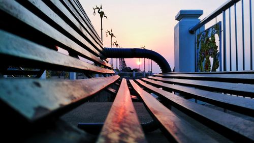 Close-up of bridge against sky in city