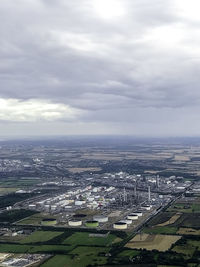 High angle view of buildings in city against sky