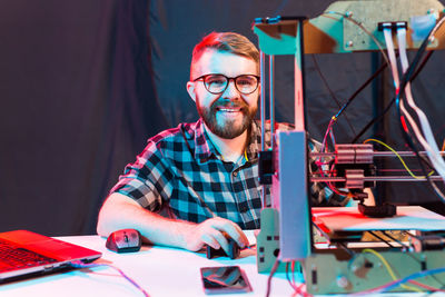 Portrait of man working at workshop