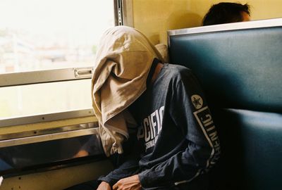 Man sitting in train