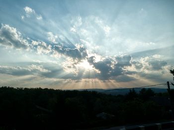 View of landscape against cloudy sky