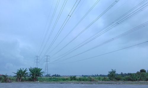 Electricity pylon against sky