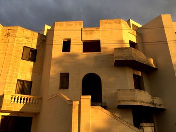 Exterior of residential building against sky