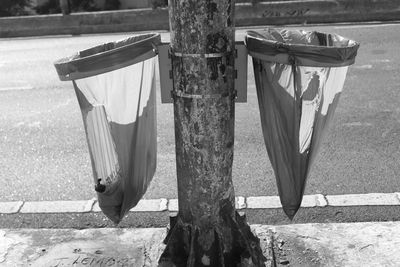 Clothes drying on wooden post