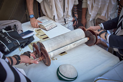 Midsection of man working at table