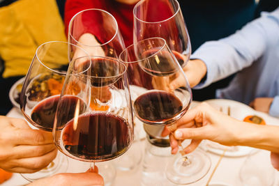Close-up of hand holding wineglass
