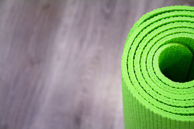 Close-up of rolled exercise mat