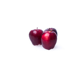 Close-up of apple against white background