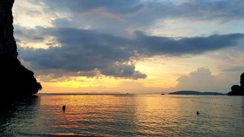 Scenic view of sea against cloudy sky