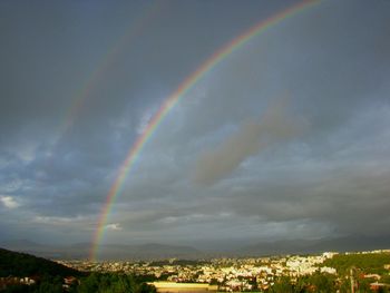 Low angle view of rainbow against sky