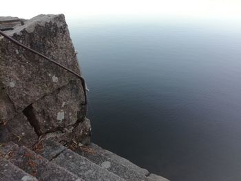 High angle view of rock formation in sea