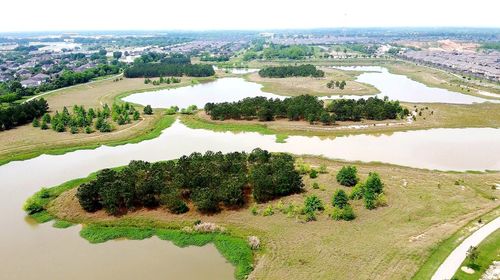 High angle view of trees on landscape against sky