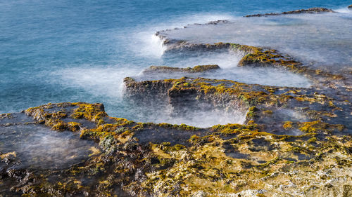 View of rocks in sea