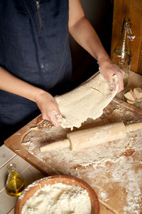 Midsection of woman preparing food